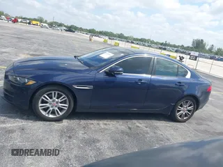 2019 Jaguar XE 25t Premium with VIN SAJAD4FX4KCP47267, listed as a IAAI auction lot 42113311 with 63,914 mi miles. Bid and sale history available at carsss.com. Image 14.
