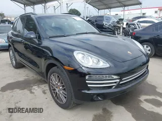 2014 Porsche Cayenne with VIN WP1AA2A29ELA97300, listed as a IAAI auction lot 42106931 with 156,129 mi miles and . Bid and sale history available at DreamBid. Image 1.