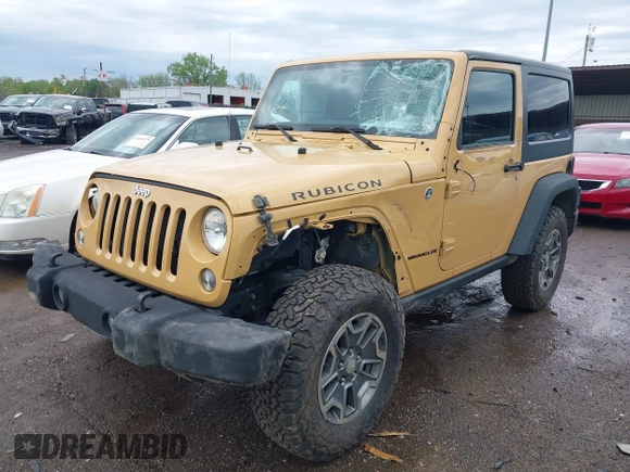 2014 Jeep Wrangler Rubicon with VIN 1C4BJWCG4EL145081, listed as a IAAI auction lot 42180723 with 113,659 mi miles and . Bid and sale history available at DreamBid. Image 2.