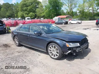 2015 Audi A8 4.0T z VIN WAU32AFD4FN002477, wystawiony jako IAAI lot #42157514 z przebiegiem 151 729 mil mil oraz . Historia ofert i sprzedaży dostępna na DreamBid. Obrazek 1.
