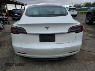 2023 Tesla Model 3 with VIN 5YJ3E1EAXPF600008, listed as a Copart auction lot 51868055 with 58,733 mi miles and Salvage title. Bid and sale history available at DreamBid. Image 6.