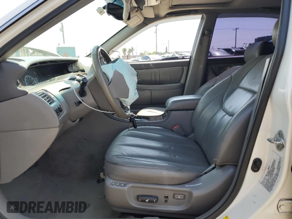 2000 Toyota Avalon XL with VIN 4T1BF28B9YU068001, listed as a Copart auction lot 54958915 with 240,232 mi miles and Salvage Title. Bid and sale history available at DreamBid. Image 7.