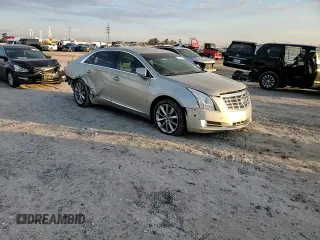 2014 Cadillac XTS Premium z VIN 2G61P5S3XE9246932, wystawiony jako Copart lot #84531124 z przebiegiem 152 330 mil mil oraz Szkoda całkowita • Salvage title. Historia ofert i sprzedaży dostępna na DreamBid. Obrazek 11.