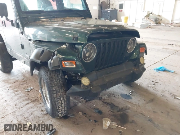 2000 Jeep Wrangler Sport with VIN 1J4FA49S8YP780104, listed as a IAAI auction lot 42095731 with Not provided miles and . Bid and sale history available at DreamBid. Image 14.