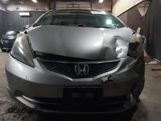 2010 Honda Fit with VIN JHMGE8H29AS020675, listed as a IAAI auction lot 41832465 with 212,713 mi miles. Bid and sale history available at carsss.com. Image 6.