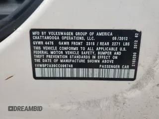 2012 Volkswagen Passat SE с VIN 1VWBP7A39CC096748, выставлен на аукционе Copart как лот 58834415 с пробегом 189 119 миль миль и На запчасти • Non repairable. История ставок и продаж доступна на DreamBid. Изображение 12.