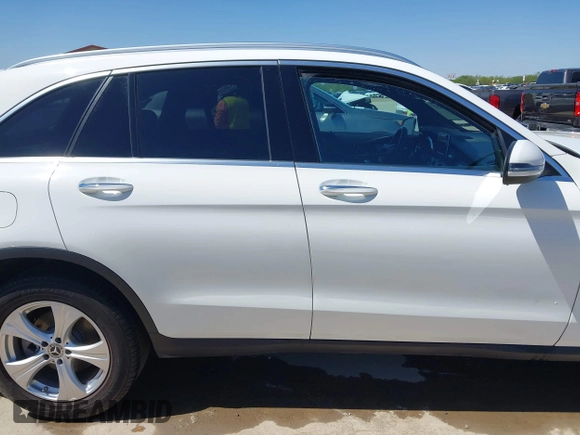 2018 Mercedes-Benz GLC 300 with VIN WDC0G4JB9JV056407, listed as a IAAI auction lot 41965217 with 77,228 mi miles and . Bid and sale history available at DreamBid. Image 14.