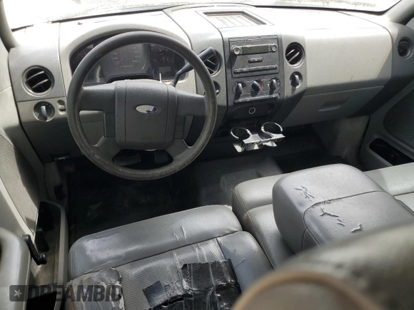 2005 Ford F-150 STX with VIN 1FTRX12W55NA33581, listed as a Copart auction lot 53717995 with 291,549 mi miles and Salvage title. Bid and sale history available at DreamBid. Image 8.