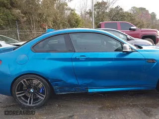 2017 BMW M2 with VIN WBS1H9C57HV886785, listed as a IAAI auction lot 41716752 with 63,388 mi miles. Bid and sale history available at carsss.com. Image 13.