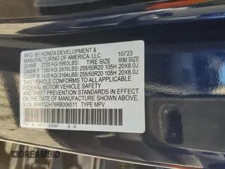 2024 Honda Pilot Touring z VIN 5FNYG2H76RB006511, wystawiony jako Copart lot #80920634 z przebiegiem 19 333 mil mil oraz Szkoda całkowita • Salvage title. Historia ofert i sprzedaży dostępna na DreamBid. Obrazek 13.