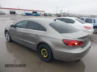 2013 Volkswagen CC Sport with VIN WVWBN7AN5DE514299, listed as a IAAI auction lot 41563521 with 199,249 mi miles. Bid and sale history available at carsss.com. Image 3.