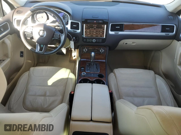 2012 Volkswagen Touareg Sport с VIN WVGEF9BP5CD011457, выставлен на аукционе Copart как лот 46785645 с пробегом 108 840 миль миль и Списание • Salvage title. История ставок и продаж доступна на DreamBid. Изображение 8.