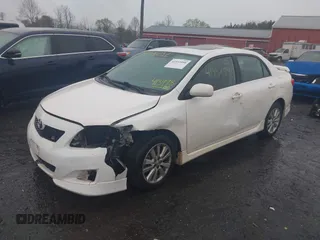 2010 Toyota Corolla with VIN 2T1BU4EEXAC413978, listed as a IAAI auction lot 41953898 with 121,676 mi miles. Bid and sale history available at carsss.com. Image 18.