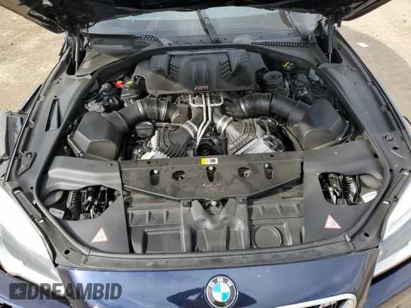 2016 BMW M6 z VIN WBS6G9C5XGD932039, wystawiony jako Copart lot #47433685 z przebiegiem 66 836 mil mil oraz Szkoda całkowita • Salvage title. Historia ofert i sprzedaży dostępna na DreamBid. Obrazek 11.