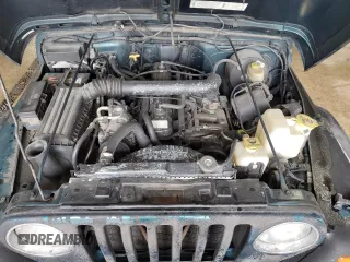 1997 Jeep Wrangler Sport with VIN 1J4FY19SXVP537075, listed as a Copart auction lot 61389915 with Not provided miles and Salvage title. Bid and sale history available at DreamBid. Image 11.