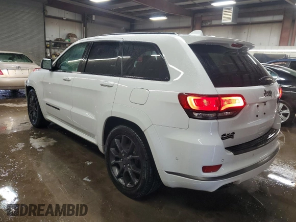 2021 Jeep Grand Cherokee Overland with VIN 1C4RJFCGXMC527435, listed as a Copart auction lot 49642405 with 84,485 mi miles and Salvage title. Bid and sale history available at DreamBid. Image 2.