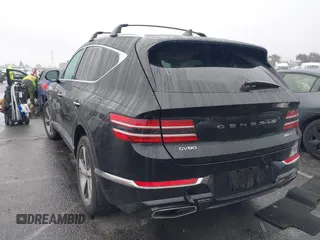 2022 Genesis GV80 Advanced Plus with VIN KMUHCESCXNU078815, listed as a IAAI auction lot 41558532 with 35,424 mi miles and . Bid and sale history available at DreamBid. Image 3.
