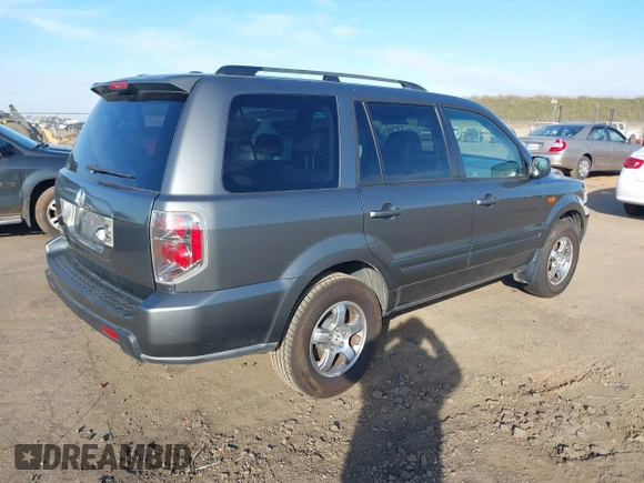 2007 Honda Pilot EX-L with VIN 5FNYF28797B001772, listed as a IAAI auction lot 41320270 with 220,227 mi miles. Bid and sale history available at carsss.com. Image 4.