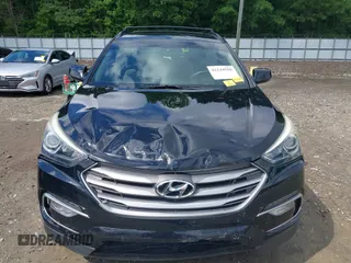 2017 Hyundai Santa Fe 2.4L z VIN 5NMZU3LB5HH043545, wystawiony jako IAAI lot #42244550 z przebiegiem 84 464 mil mil oraz . Historia ofert i sprzedaży dostępna na DreamBid. Obrazek 13.