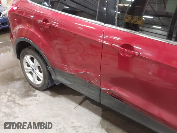 2014 Ford Escape SE z VIN 1FMCU9GX5EUA05294, wystawiony jako IAAI lot #42282028 z przebiegiem 119 046 mil mil oraz . Historia ofert i sprzedaży dostępna na DreamBid. Obrazek 6.