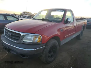 2000 Ford F-150 XL with VIN 1FTPF17L6YNA37670, listed as a Copart auction lot 83479314 with 205,364 mi miles and Salvage title. Bid and sale history available at DreamBid. Image 1.
