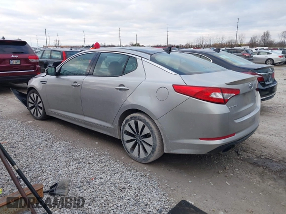 2012 Kia Optima SX with VIN 5XXGR4A62CG027184, listed as a IAAI auction lot 41236626 with 121,686 mi miles and . Bid and sale history available at carsss.com. Image 3.