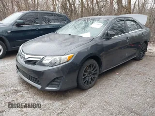 2014 Toyota Camry L z VIN 4T1BF1FK3EU322598, wystawiony jako IAAI lot #41490070 z przebiegiem 101 250 mil mil oraz . Historia ofert i sprzedaży dostępna na DreamBid. Obrazek 2.