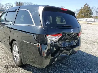 2014 Honda Odyssey EX-L with VIN 5FNRL5H64EB034147, listed as a Copart auction lot 46372795 with 156,720 mi miles and Salvage Title. Bid and sale history available at carsss.com. Image 14.