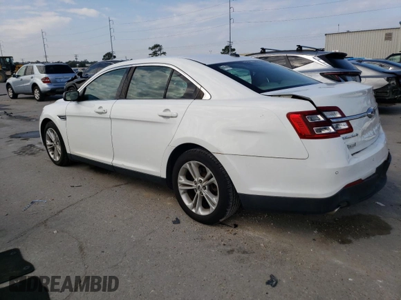 2015 Ford Taurus SEL with VIN 1FAHP2E9XFG175475, listed as a Copart auction lot 82369004 with 150,708 mi miles and Salvage title. Bid and sale history available at DreamBid. Image 2.