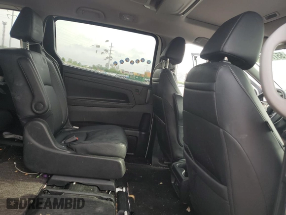 2023 Honda Odyssey Touring с VIN 5FNRL6H82PB004008, выставлен на аукционе Copart как лот 55772415 с пробегом 36 936 миль миль и Списание • Salvage title. История ставок и продаж доступна на DreamBid. Изображение 11.