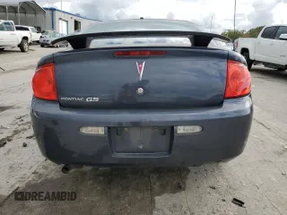 2009 Pontiac G5 z VIN 1G2AS18H397260884, wystawiony jako Copart lot #73531504 z przebiegiem 174 164 mil mil oraz Szkoda całkowita • Salvage title. Historia ofert i sprzedaży dostępna na DreamBid. Obrazek 6.