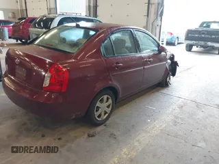 2007 Hyundai Accent GLS with VIN KMHCN46C27U111106, listed as a IAAI auction lot 41383317 with 147,882 mi miles. Bid and sale history available at carsss.com. Image 4.