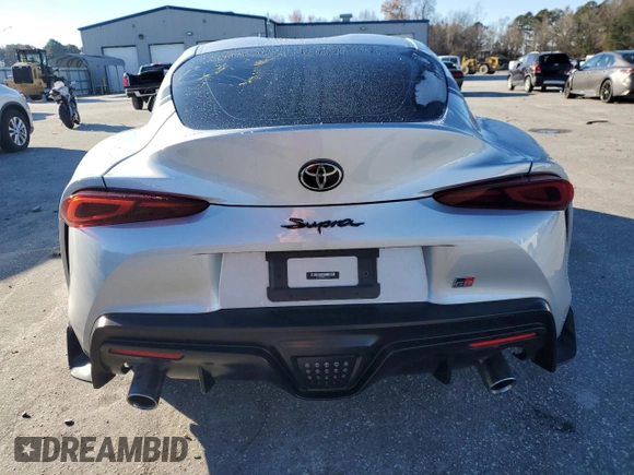 2022 Toyota Supra 2.0 with VIN WZ1DB2C08NW046734, listed as a Copart auction lot 83992154 with 43,576 mi miles and Salvage title. Bid and sale history available at DreamBid. Image 6.