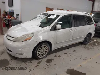 2007 Toyota Sienna XLE with VIN 5TDZK22C57S002919, listed as a IAAI auction lot 41563961 with 262,988 mi miles. Bid and sale history available at carsss.com. Image 2.