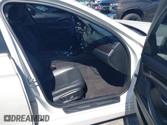 2014 BMW 5 Series 528i with VIN WBA5A5C55ED500014, listed as a IAAI auction lot 41835309 with 114,436 mi miles and . Bid and sale history available at DreamBid. Image 5.