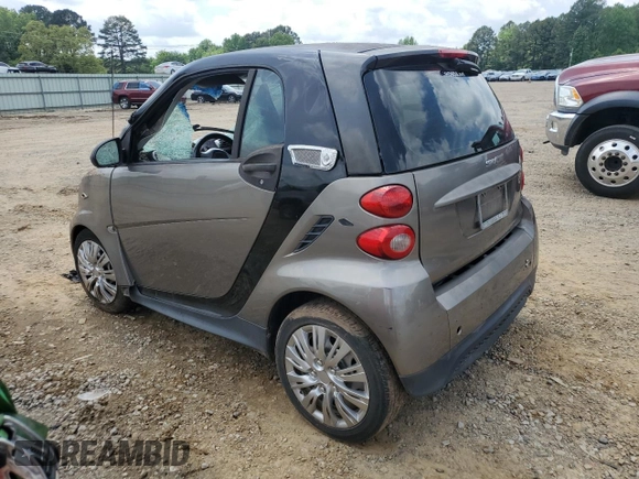 2013 Smart fortwo Pure z VIN WMEEJ3BA7DK678251, wystawiony jako Copart lot #54522125 z przebiegiem Nie podano mil oraz Tytuł czysty. Historia ofert i sprzedaży dostępna na DreamBid. Obrazek 2.
