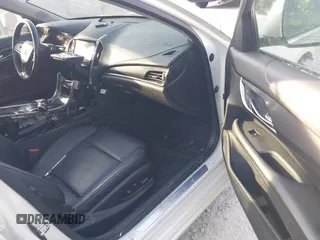 2014 Cadillac ATS Standard AWD with VIN 1G6AG5RX8E0152177, listed as a IAAI auction lot 42095293 with 143,485 mi miles and . Bid and sale history available at carsss.com. Image 5.