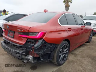 2019 BMW 3 Series 330i xDrive with VIN WBA5R7C50KFH28767, listed as a IAAI auction lot 42206528 with 52,529 mi miles and . Bid and sale history available at DreamBid. Image 4.
