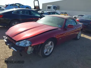 1997 Jaguar XK with VIN SAJGX2748VC011754, listed as a IAAI auction lot 41979459 with 34,601 mi miles and . Bid and sale history available at DreamBid. Image 2.