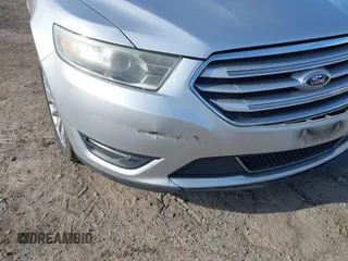 2014 Ford Taurus Limited with VIN 1FAHP2F86EG134779, listed as a IAAI auction lot 41660527 with 115,016 mi miles. Bid and sale history available at carsss.com. Image 17.