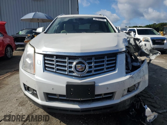2014 Cadillac SRX Premium Collection z VIN 3GYFNGE31ES615593, wystawiony jako Copart lot #56785775 z przebiegiem 247 230 mil mil oraz Tytuł czysty. Historia ofert i sprzedaży dostępna na DreamBid. Obrazek 5.
