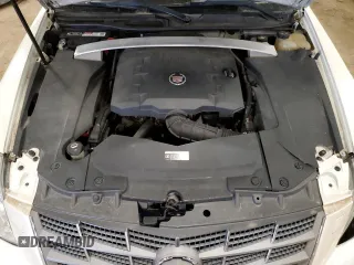2010 Cadillac STS AWD z VIN 1G6DU6EV0A0106434, wystawiony jako Copart lot #52439915 z przebiegiem 90 187 mil mil oraz Czysty tytuł • Clean title. Historia ofert i sprzedaży dostępna na DreamBid. Obrazek 11.