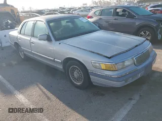 1994 Mercury Grand Marquis LS z VIN 2MELM75W9RX669484, wystawiony jako IAAI lot #41838499 z przebiegiem 101 777 mil mil oraz . Historia ofert i sprzedaży dostępna na DreamBid. Obrazek 1.