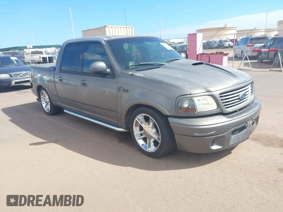 2002 Ford F-150 Harley Davidson with VIN 1FTRW07312KC88379, listed as a IAAI auction lot 41657219 with 1 mi miles. Bid and sale history available at carsss.com. Image 1.