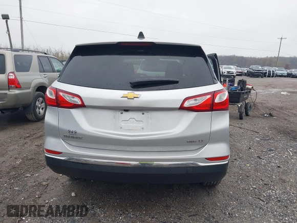 2018 Chevrolet Equinox LT with VIN 2GNAXSEV0J6118016, listed as a IAAI auction lot 42010356 with 95,254 mi miles and . Bid and sale history available at DreamBid. Image 16.