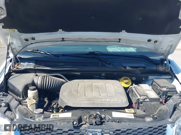 2016 Dodge Grand Caravan SE with VIN 2C4RDGBG9GR401187, listed as a IAAI auction lot 42133432 with 107,742 mi miles and . Bid and sale history available at DreamBid. Image 10.