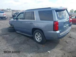 2016 Chevrolet Tahoe LT with VIN 1GNSCBKC2GR257077, listed as a IAAI auction lot 42091171 with 118,660 mi miles and . Bid and sale history available at DreamBid. Image 3.