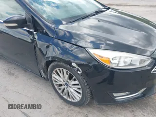 2015 Ford Focus Titanium с VIN 1FADP3J28FL213712, выставлен на аукционе IAAI как лот 42158433 с пробегом 173 696 миль миль и . История ставок и продаж доступна на DreamBid. Изображение 6.