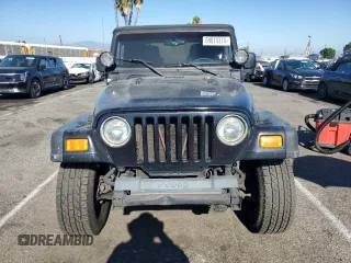 2005 Jeep Wrangler Rubicon with VIN 1J4FA69SX5P343826, listed as a Copart auction lot 69074374 with 179,610 mi miles and Salvage Title. Bid and sale history available at carsss.com. Image 5.