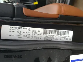 2011 Jeep Grand Cherokee Overland with VIN 1J4RR6GT9BC660730, listed as a Copart auction lot 53770745 with 106,351 mi miles and Salvage title. Bid and sale history available at DreamBid. Image 12.